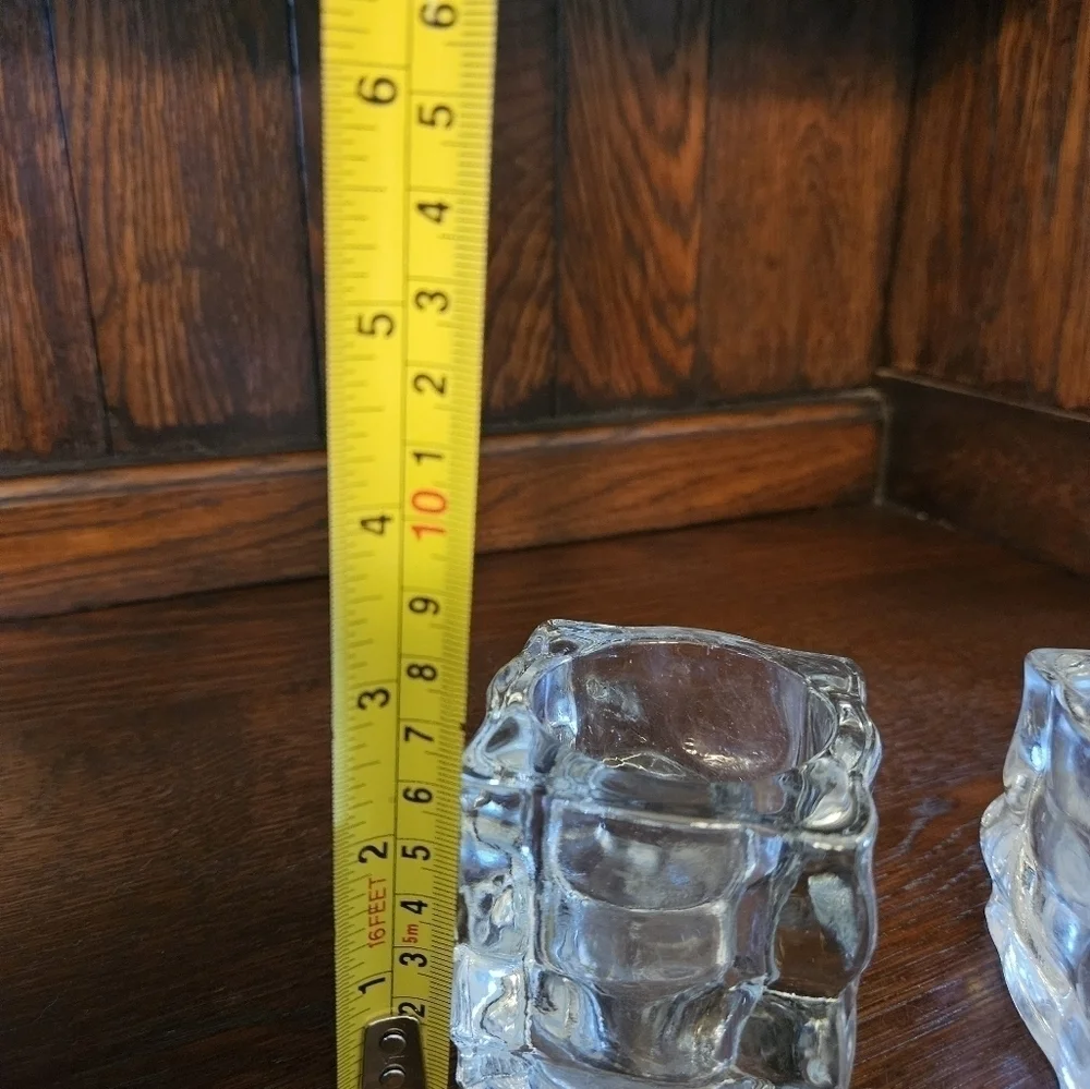 Glass ice cube candle votives.